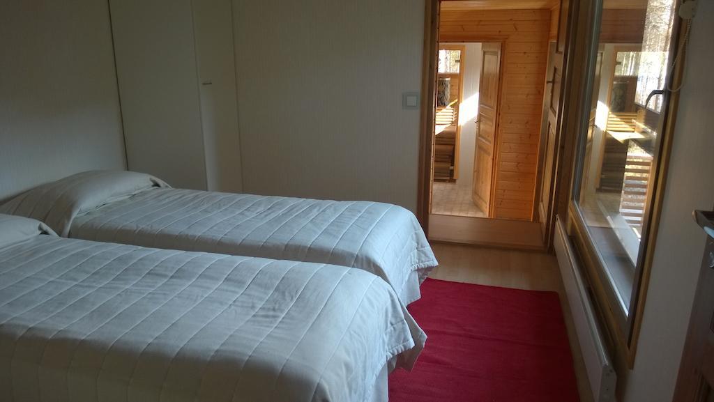 Kuoreksenniemi Villas & Lakehouse Puumala Værelse billede